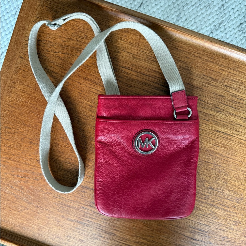 Red leather Michael Kors crossbody purse